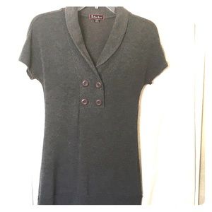 Woman’s grey sweater top